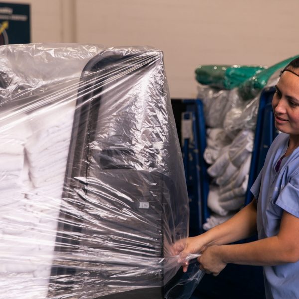 Clean healthcare linens prepped for transport.